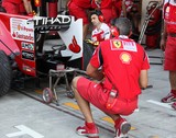 Mechanics and Engineers Ferrari stand Pit lane Abu Dhabi Grand Prix Formula 1 Emirats Arabes Unis