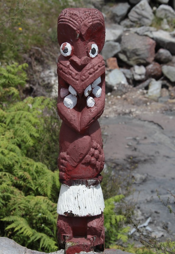 Tradional moari statue in village new zealand north island