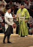 yobidashi 呼び出し announcer professional sumo wrestler dohyō traditional folding fan Tokyo Japan