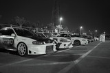Red bull drift competition car park  Abu Dhabi black and white picture