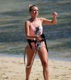 Sexy girl sport Kitesurf pink swimsuit Aircalin New Caledonia woman watersport