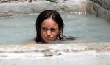 not happy penny diver girl resting in hot bath new zealand