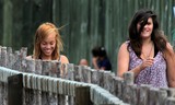 maori girls among tourists in new zealand