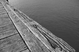 White and black photography New Zealand wooden deck abour quay artist