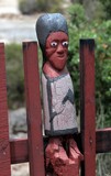 ugly moari statue in village new zealand north island