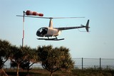 Helicopter Robinson R44 take off New Caledonia flying scenic tour pictures photographer